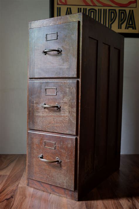 antique steel filing cabinet|old fashioned wooden filing cabinet.